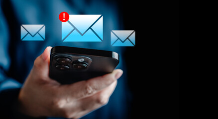 Businesswomen checking email via smartphone have spam malware screen alerts, cyber internet web...