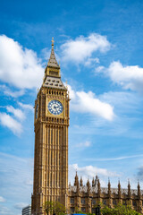 Low angle of aged building of famous Big Ben against clock tower located on street of London...