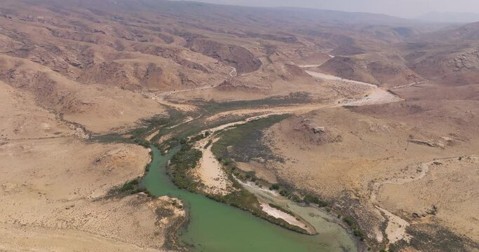 Panorama Of Arid Mountains Near The Island Beach Of Shoab In Qalansiyah, Yemen. Aerial Drone Shot