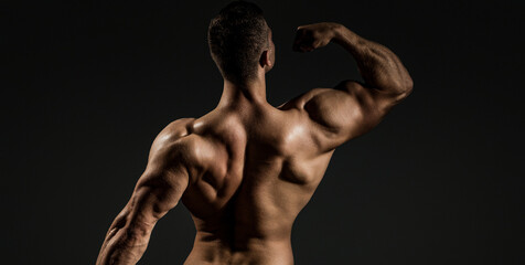 Sexy model. Muscular body. Strong man. Man Power. Perfect Shoulders and Back Muscles. Muscular Man...
