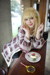 Portrait of a beautiful young woman game Cosplay with blonde hair - 692309860