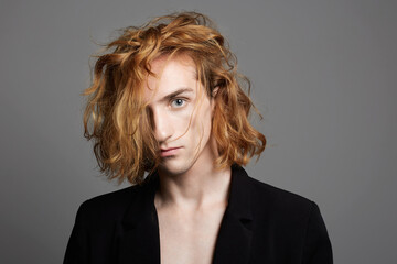 Boy with red hair. handsome young Man with trendy Hairstyle