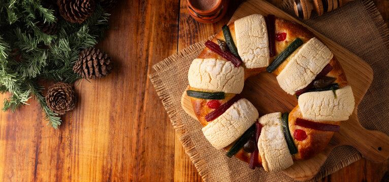 Three Kings Bread also called Rosca de Reyes, Roscon, Epiphany Cake, traditionally served with hot chocolate in a clay Jarrito. Mexican tradition on January 5th.