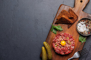 Savory beef tartare and brown bread toasts
