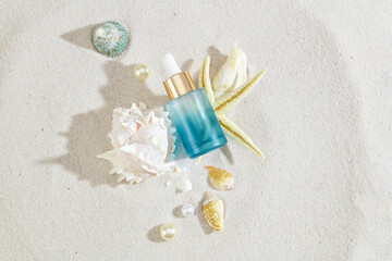 Fototapeta na wymiar Sandy setting highlights a serum bottle adorned with sea shells. Ready for branding, blank labels create an ideal canvas for seasonal promotions. Natural beauty.