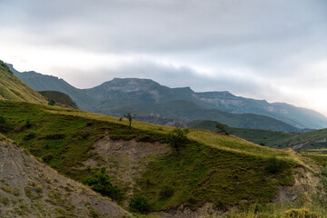 Caucasian mountain. Dagestan. Trees, rocks, mountains, view of the green mountains. Beautiful summer landscape.