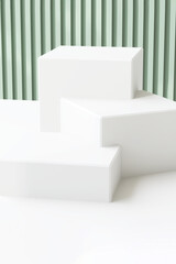 Three modern white cuboid podium, geometric pedestal on counter, dappled light on green corrugated...