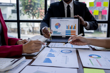 Team Of Business working at the office with documents on desk, planning analyzing the financial report, business plan investment, Consultant, finance analysis concept