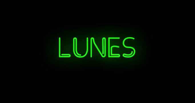 Flashing neon green Spanish Lunes sign on black background on and off with flicker