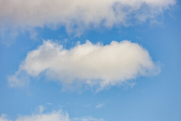 A beautiful sky tinted by the sun leaving vibrant shades of gold, pink, blue and multicolored. Clouds in the twilight evening and morning sky. Image of a cloudy sky in the evening and during the day