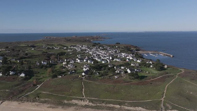 Island of Houat and town off the Bay of Quiberon on the Atlantic Brittany coast of France, Aerial dolly right shot