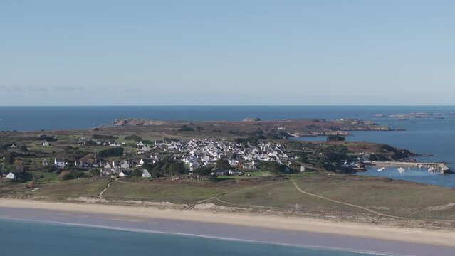 Town in the island of Houat off the Bay of Quiberon France on the Atlantic Brittany coast, Aerial pan right shot