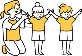 子どもに体操を教えている女性の先生