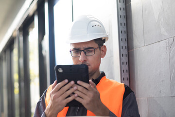technician male with helmet working outside