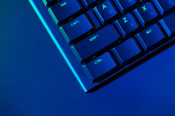Close up of computer keyboard on black background