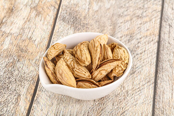 Shelled dry almond nut heap