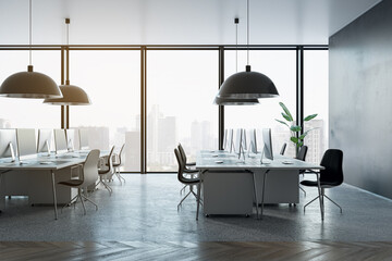 Clean coworking office interior with panoramic windows and city view, furniture and lamps. 3D Rendering.