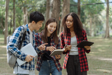 Group of students with books preparing for exams during holidays.