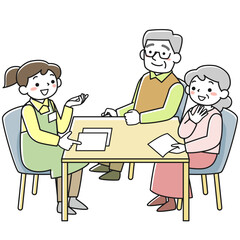 ケアプランの相談をするシニア夫婦とケアマネージャー