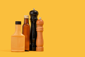 Sweet mustard, olive oil and salt, pepper shakers. Copy space for text.