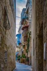 A characteristic Maltese alley with colorful balconies in Rabat village
