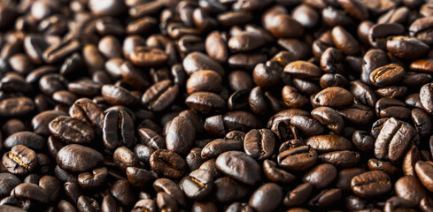 Close up black coffee beans texture background