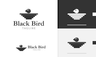 Logo design icon of geometric animal bird eagle crow head flat wing in black simple modern style