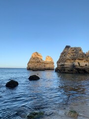 Rocky coastline of Praia do Camilo beach of Algarve.