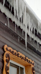 Icicles on the eaves of a village house