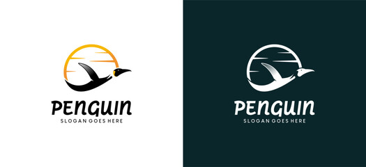 Flying penguin logo design template with sky background © SlametWahono