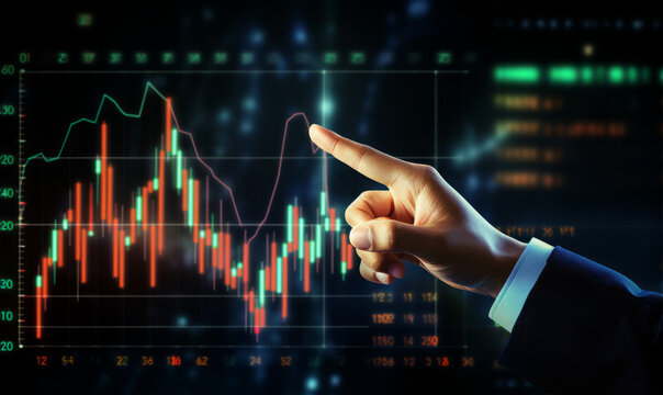 Finger points to a financial chart
