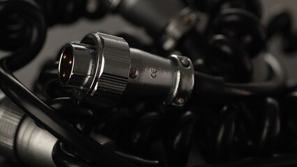 Rotating Power Cables and Connectors for Studio Equipment. Close-up, shallow dof.