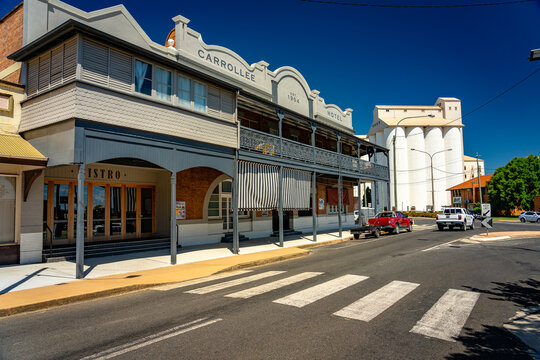 Kingaroy, QLD, Australia - Dec 6, 2023: Historical Carrollee hotel with Kingaroy Peanut Silos in the background