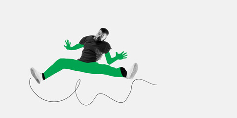 Young man dancing breakdance over light background. Freestyle. Hip-hop, street style. Contemporary art collage.