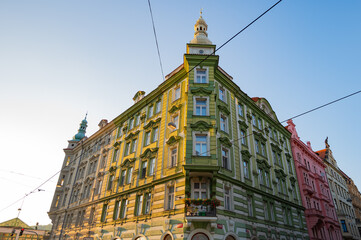 Fototapeta premium Prague, Czech Republic - September 25, 2023 - A walk through the city of Prague by the Vltava River, a dancing house and a sunset.