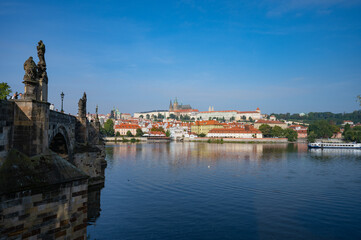 Fototapeta na wymiar Prague, Czech Republic - September 26, 2023 - View of Charles Bridge, and the surroundings of Prague's Old Town.