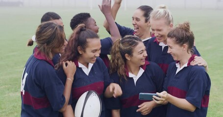 Team, rugby and women with a cellphone, fitness and connection with social media, field and funny. Players, group and girls with a smartphone, humor and laughing with internet, smile and workout - Powered by Adobe