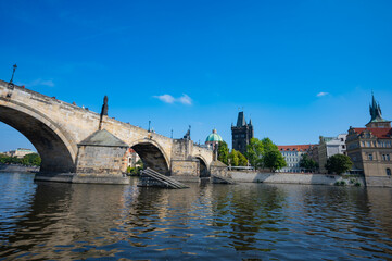 Fototapeta premium Prague, Czech Republic - September 26, 2023 - View of Charles Bridge, Old Town, Vltava River during a boat trip in Prague.