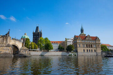 Naklejka premium Prague, Czech Republic - September 26, 2023 - View of Charles Bridge, Old Town, Vltava River during a boat trip in Prague.