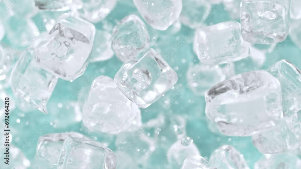 Poster super slow motion of rotating ice cubes, top view shot. filmed on high speed cinema camera, 1000 fps