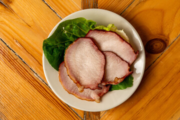 Canadian bacon on a plate