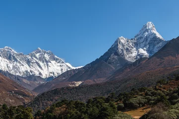 Photo sur Plexiglas Ama Dablam View of Nuptse, Everest, Lhotse and Ama Dablam mountains during trekking in Nepal in a clear day. EBC or Three passes trek in Nepal. Mountain range Himalayas in the Khumbu region of Nepal, Asia.