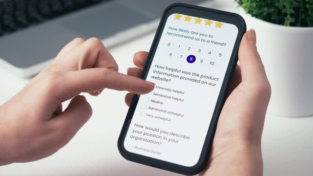 Taking a customer satisfaction survey online using a smartphone.
