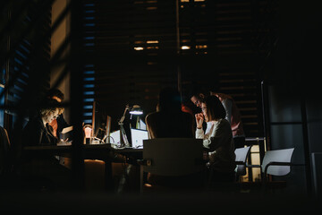 Collaborative Business Team Analyzing Data for Growth and Profitability