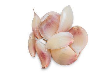 Several cloves of garlic lying together isolated on a transparent background.