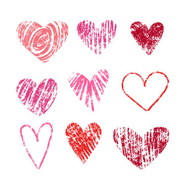 Red and pink Hearts drawn with crayons icons set. Hand drawn textured hand drawn vector illustrations for Valentine's day.