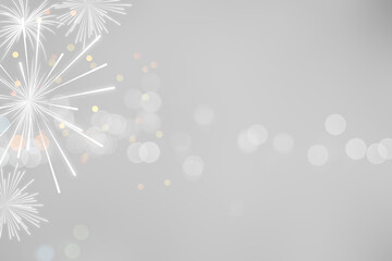 abstract group gray color background with bokeh light and fireworks glitter for anniversary season...