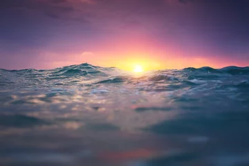 Foto op Plexiglas Sea wave close up, low angle view, sunrsie shot © ValentinValkov