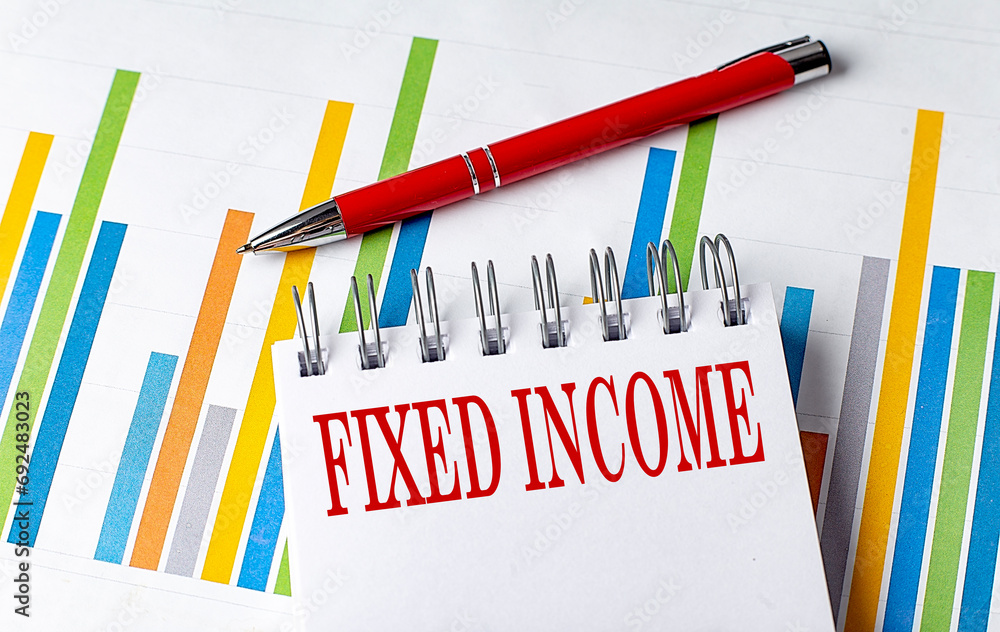 Poster fixed income text on a notebook with chart and pen business concept