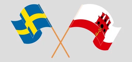 Foto op Aluminium Crossed and waving flags of Sweden and Gibraltar © valyalkin